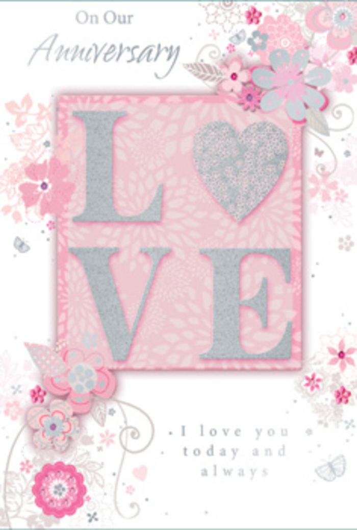 The anniversary card in the image feels like a keepsake discovered in a sunlit corner of a Keston sitting room, its design radiating warmth and devotion. Dominating the centre is the word LOVE, printed in tall, graceful capitals and finished with a frosted glitter that looks almost velvety to the touch. Soft blush pink and pearlescent white blend through each letter, with a dusting of silver that sparkles subtly, as if catching the low afternoon light over Keston's gardens. Around this central motif, airy, hand-drawn flowers stretch gracefully towards the edges of the card, their petals traced in pale pinks, lilacs, and whisper-light greys. The lines are fine and fluid, like a florist's pencil sketch when mapping out an anniversary arrangement for a couple living near Keston Mark or walking regularly around Keston Ponds. Small clusters of leaves, swirling stems, and occasional tiny dots of shine create an almost lacy border, giving the impression of blossoms gently drifting in a breeze. Between these illustrations, understated script spells out an intimate message of enduring love, the lettering poised and calm, with the softness of a handwritten note. The pastel background-tinted with rose and ivory-underglows the artwork, adding a tranquil, dreamlike quality. The card's overall composition suggests a hand-tied bouquet translated into paper: thoughtful, romantic, and quietly luxurious, ideal for marking an anniversary with the same heartfelt care that goes into a lovingly crafted local floral arrangement.
